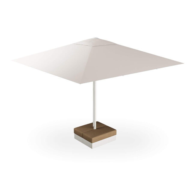 L’ombrellone Maggiore 5x5 metri, design Christophe Pillet, trasforma ogni spazio esterno in un luogo elegante e accogliente. Con un’ampiezza che copre 25 metri quadrati, è perfetto per l’uso contract, permettendo di allestire più tavoli e sedute con stile. Il basamento può essere arricchito con un cuscino, trasformandosi in una pratica seduta dining, ideale per momenti di convivialità. Il meccanismo di apertura e chiusura semplice e intuitivo, il sistema antivento e gli snodi in alluminio dal design tecnologico uniscono funzionalità ed eleganza in un gesto solo. Completano l’ombrellone accessori pensati per il comfort e lo stile: kit luci LED dimmerabili, gronda di scolo, sistemi di fissaggio a terra e cover protettiva. Maggiore non è solo protezione dal sole, ma il cuore raffinato di ogni terrazzo, giardino o spazio contract, capace di creare atmosfere uniche e conviviali.