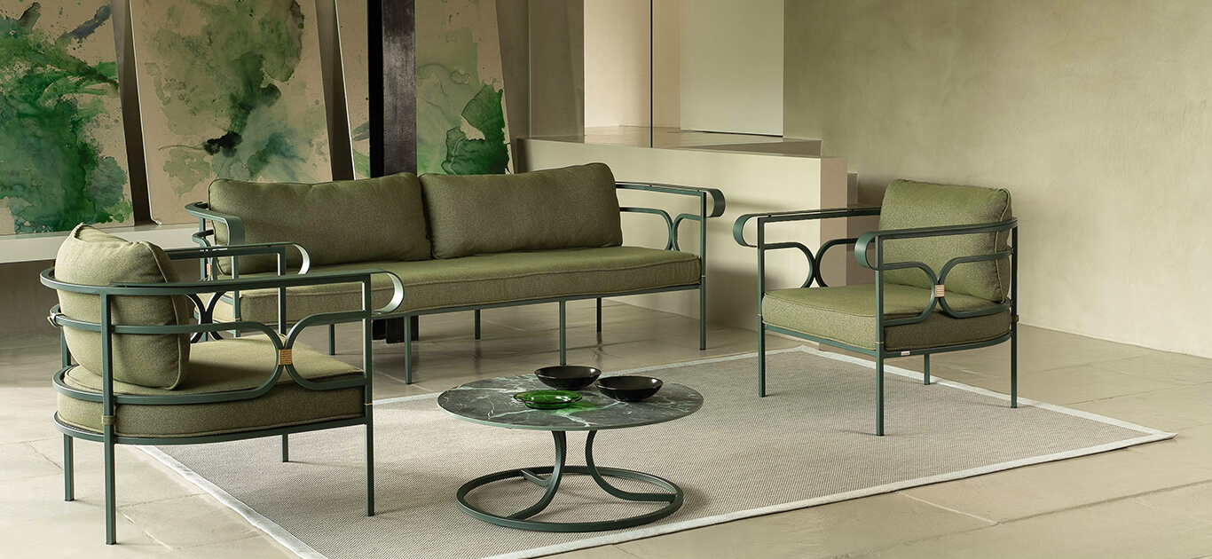 Collier, designed by LCM Marin Design Studio, is a classic collection that stands out for its elegance and harmonious forms. The refined details and playful geometric contrasts evoke traditional forms and inspirations, making it an ideal furnishing solution for sophisticated settings, both in hospitality and residential contexts. The sofa collections complete the dining set, a brass-coloured decorative element enhances the armrests of both the lounge chairs and of the two and three-seater sofas. The distinctive shape is attractive and enveloping, each curve is a soft embrace, each line is a delicate thread of comfort.